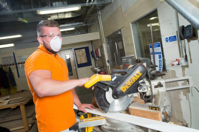 Student using saw