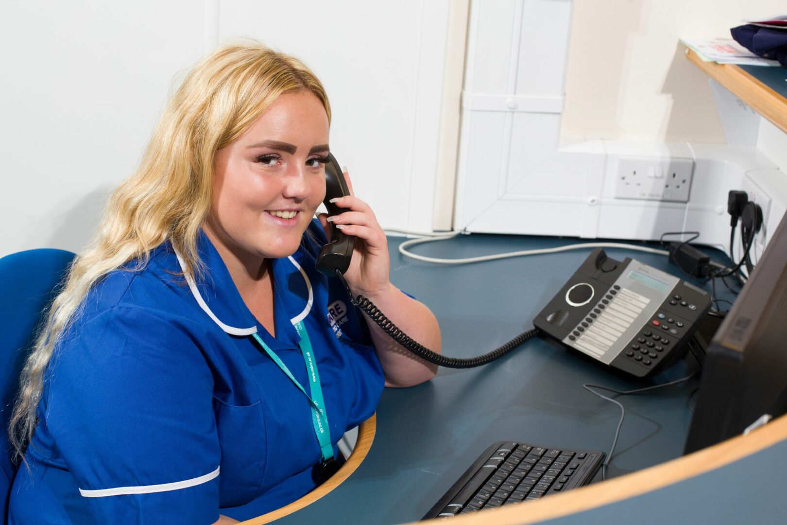 Student on phone in healthcare ward