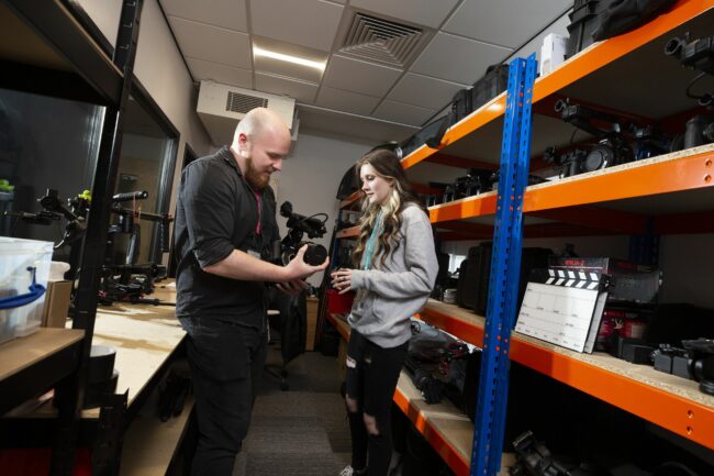 Tutor and Student looking at camera