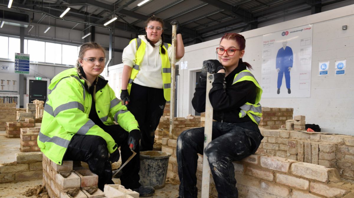 Bricklaying students Lilly Collins, Georgia Biswas and Jessica Costello