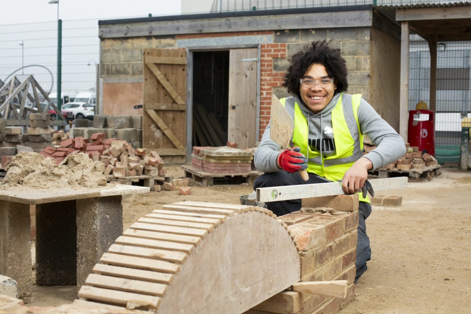 Student in construction yard