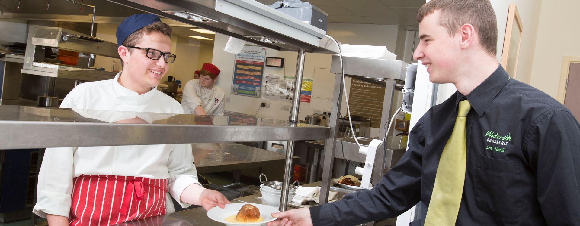 Catering and hospitality students in restaurant