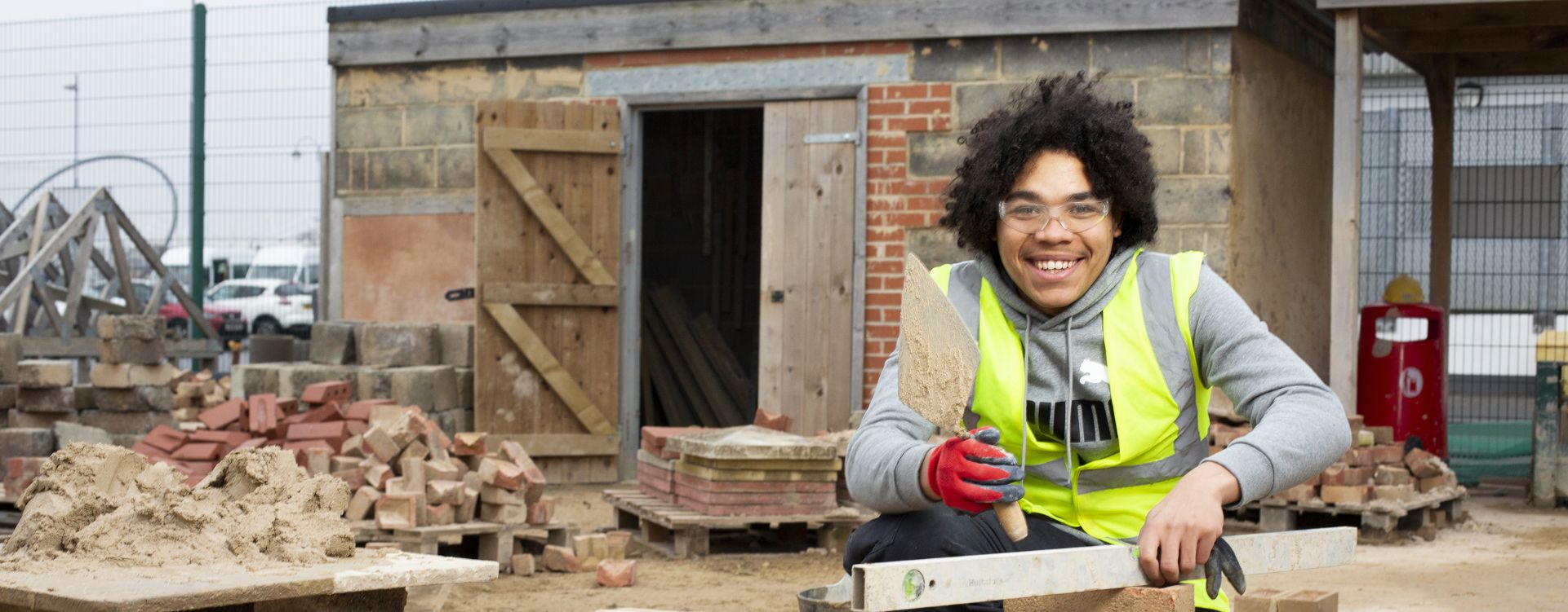 Construction student in construction yard