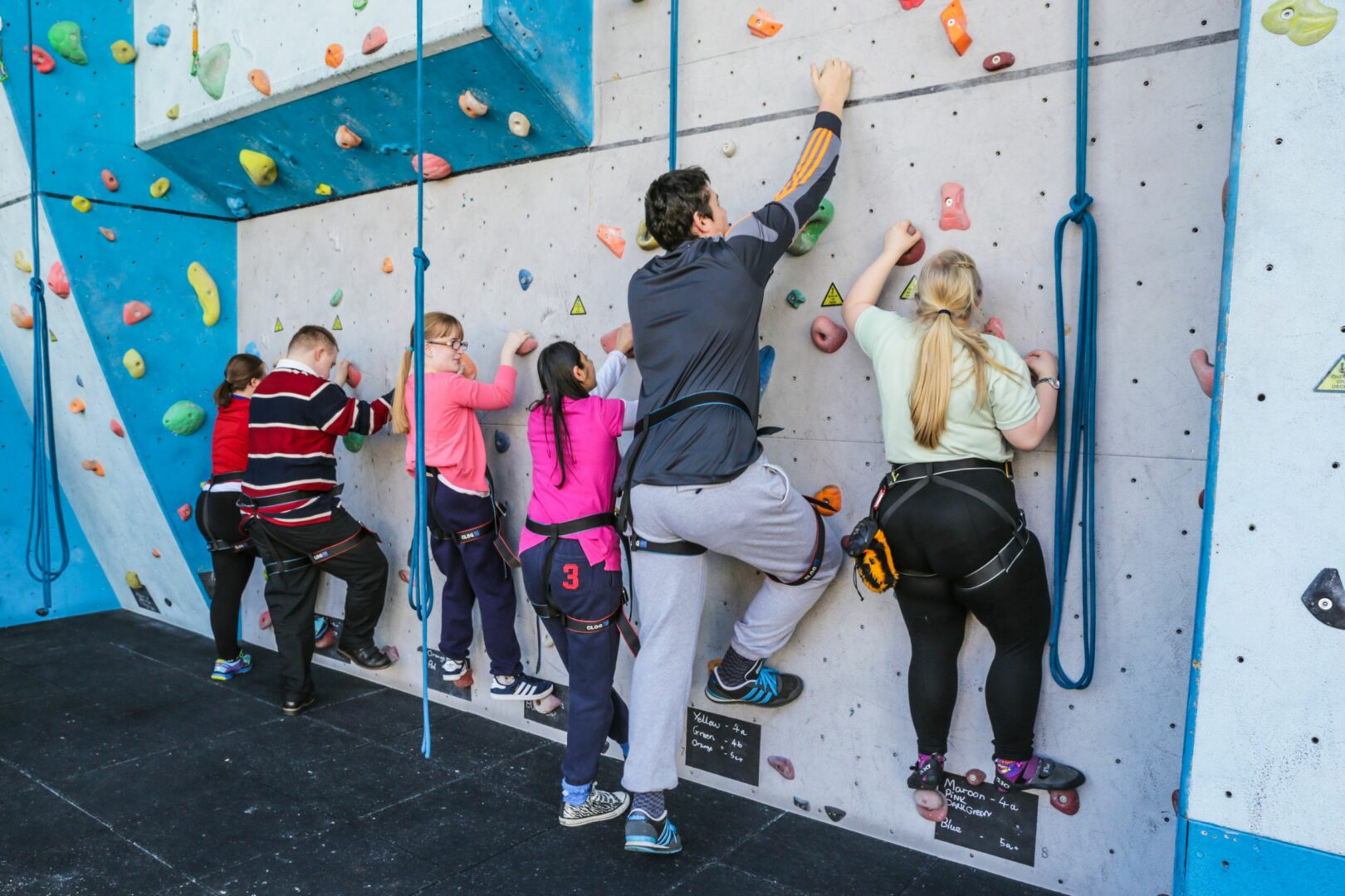 Students rock-climbing