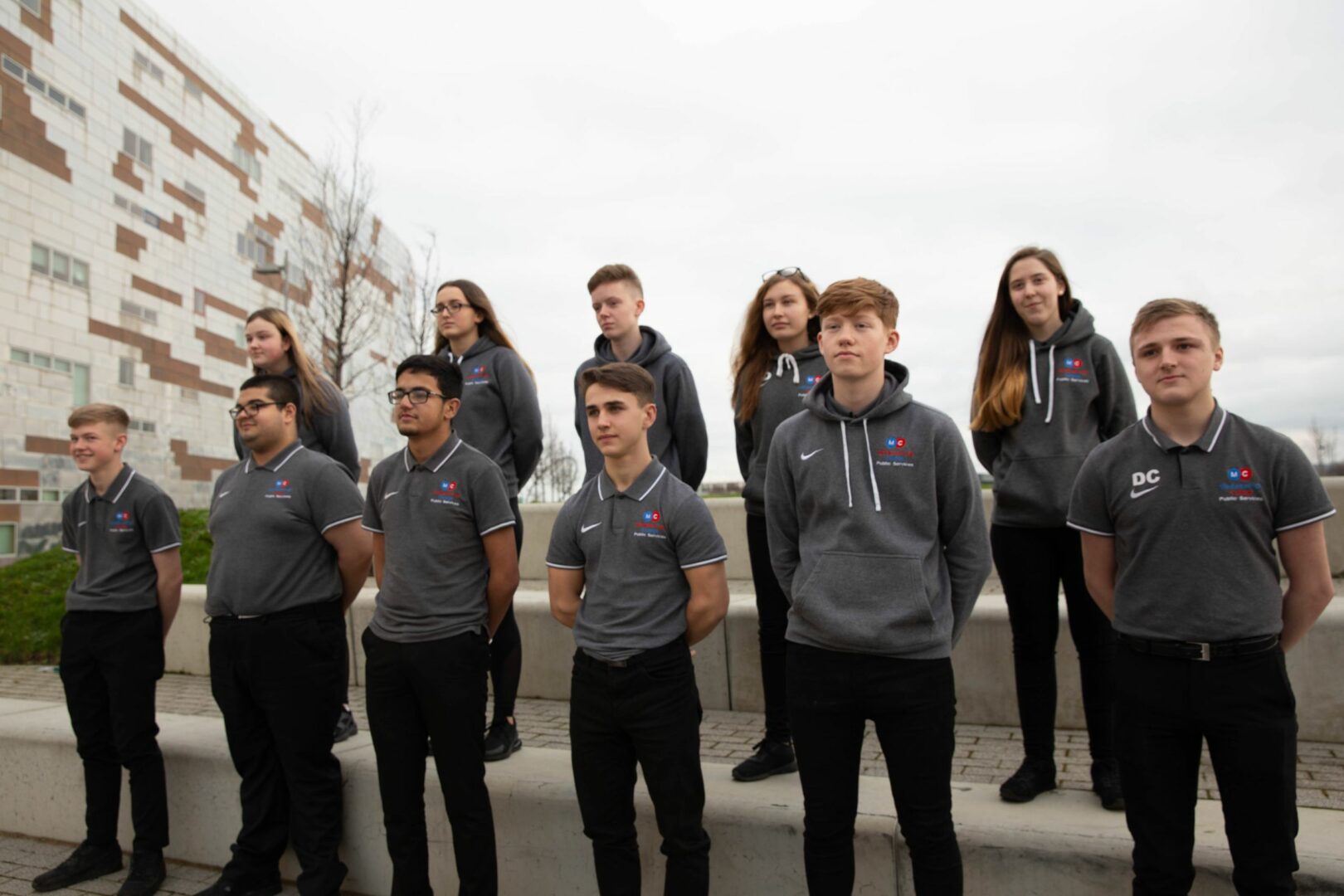 Public service students standing outside