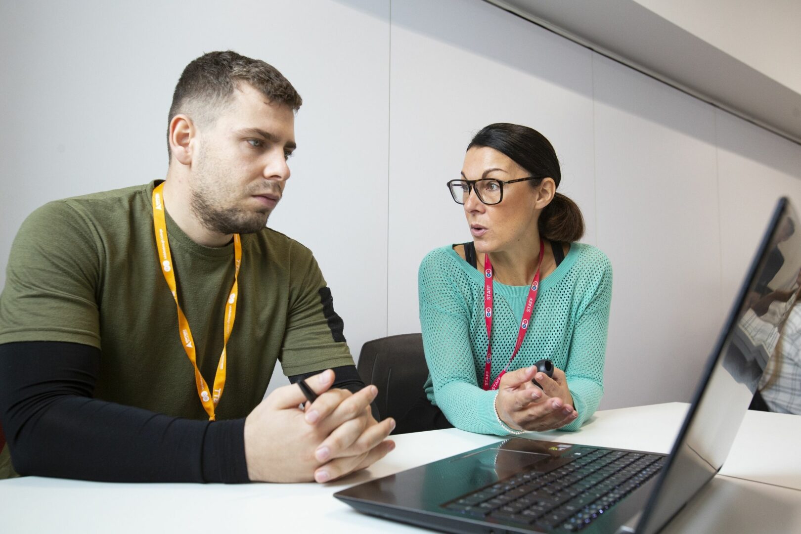 Tutor teaching a student