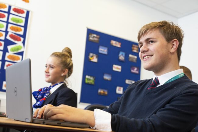 Travel students in classroom