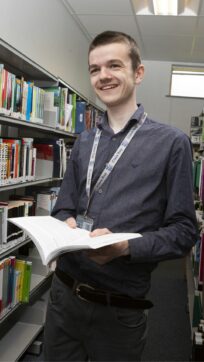 Business student holding book