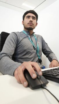 IT student on computer