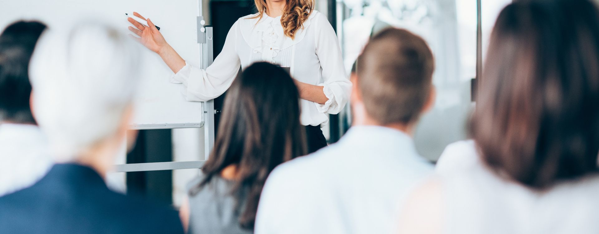 Woman presenting to a class