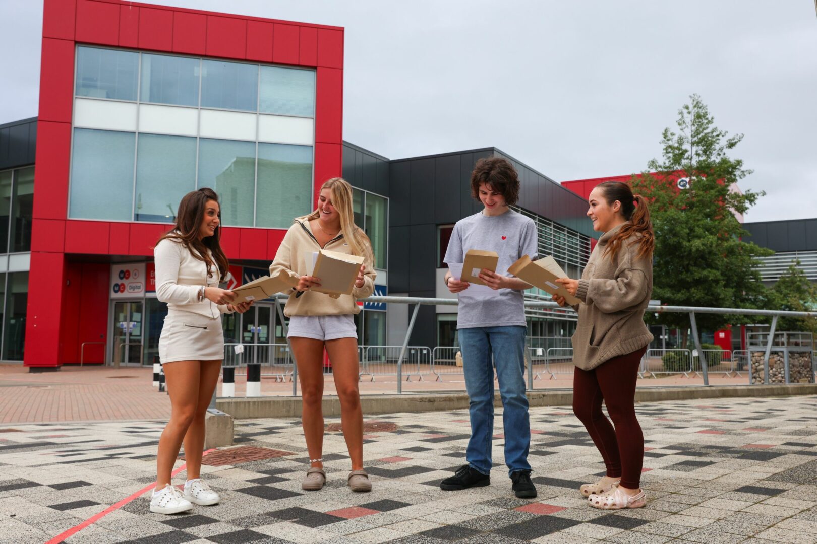 Students look at results