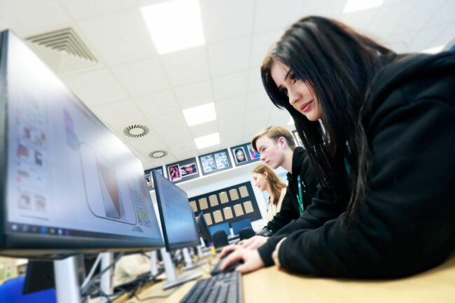 Creative arts student working on computer