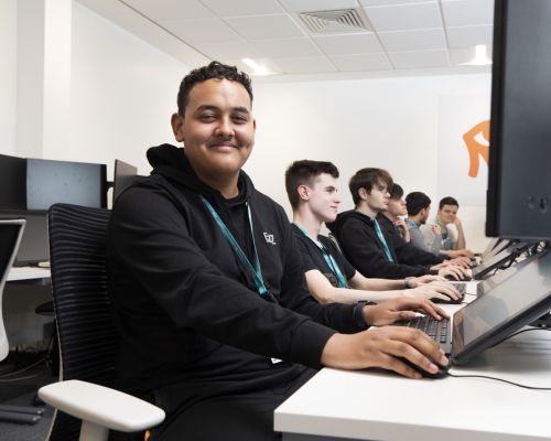 IT student working on computers