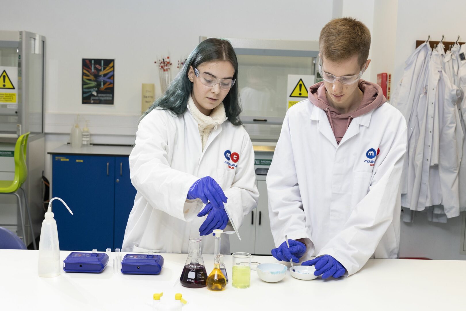 Science students working in laboratory