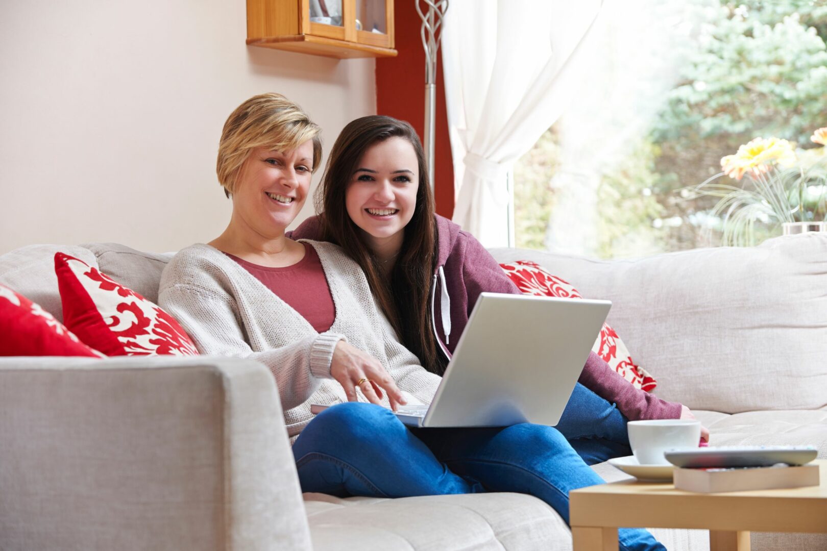 Mother and daughter on laptop