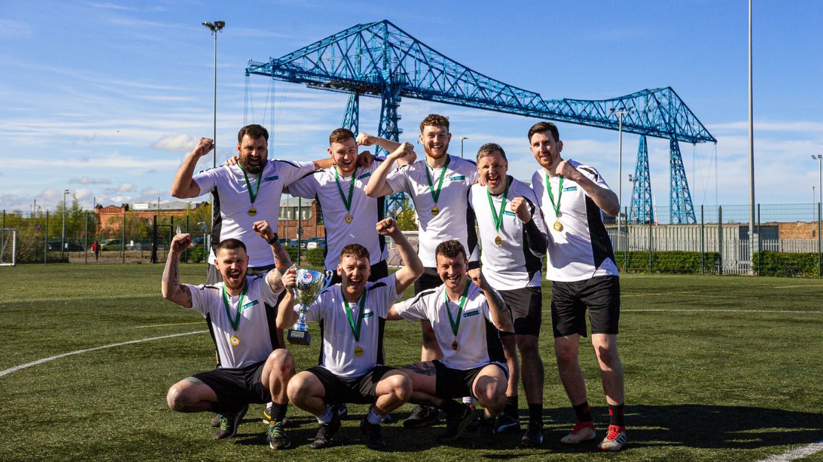 Charity football match players