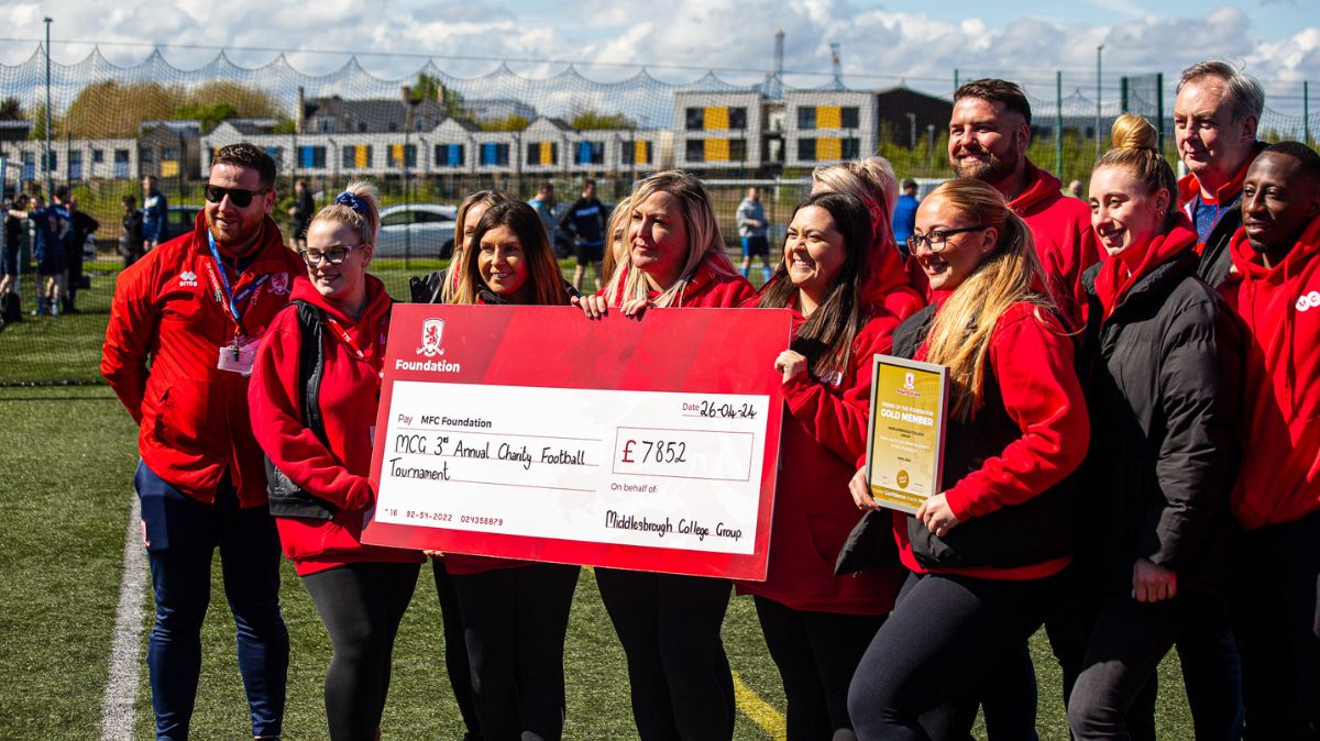 Northern Skills Team present the cheque to MFC Foundation