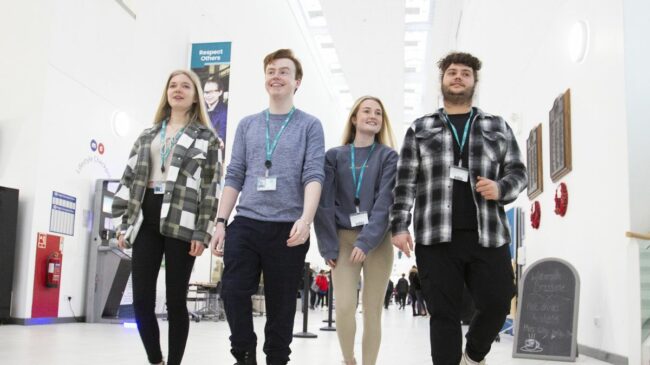Students Walking Down Corridor