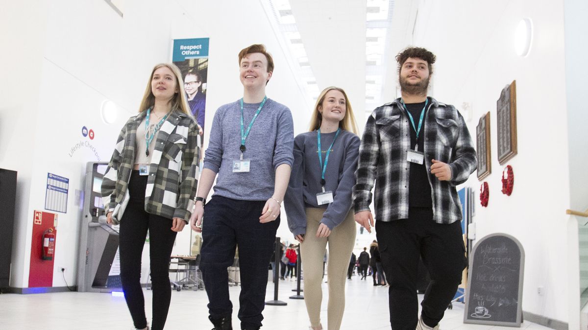 Students Walking Down Corridor