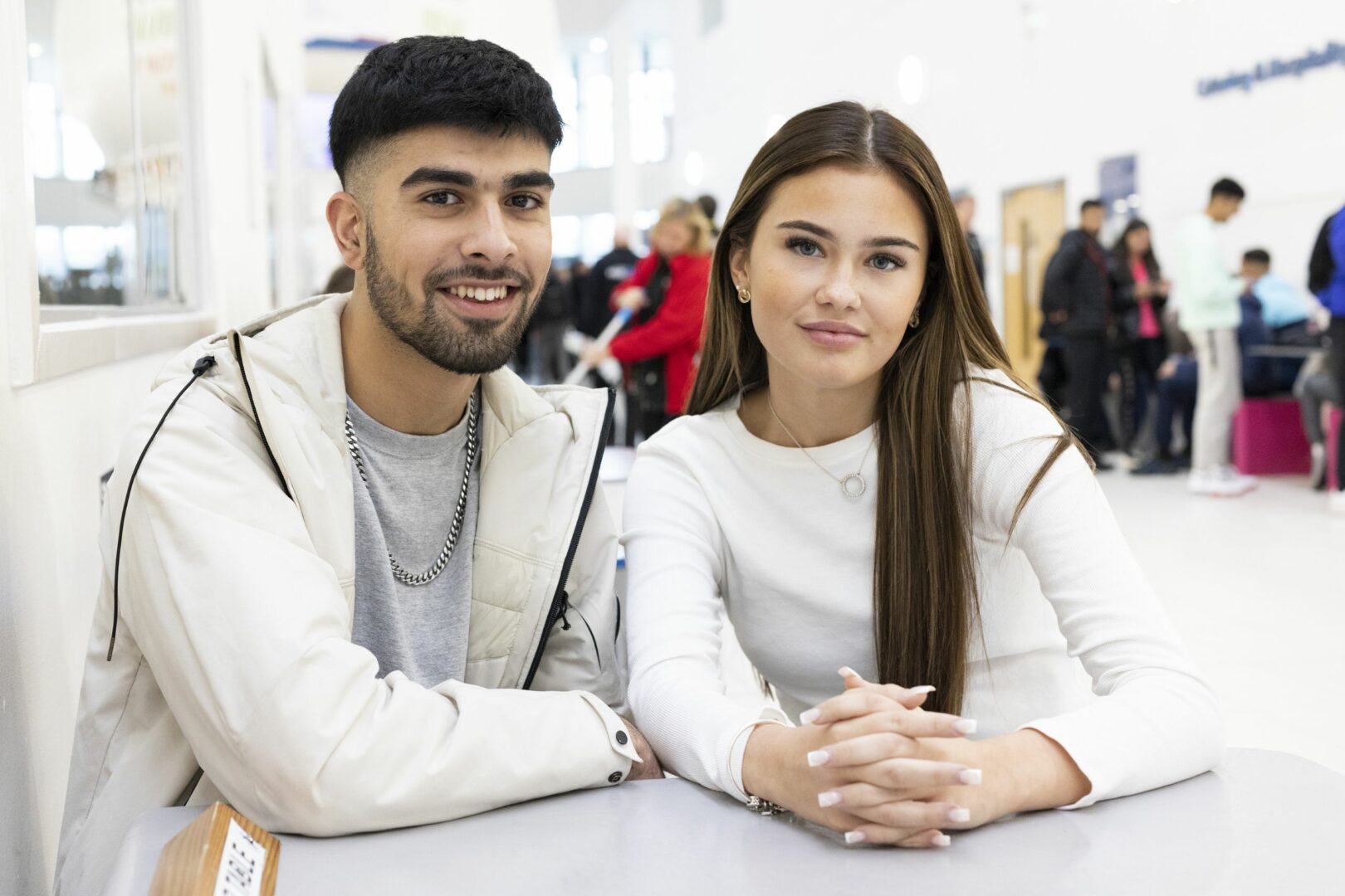 Students sitting on street
