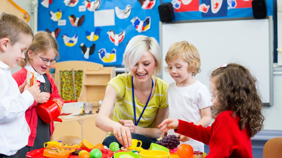 Teacher with children