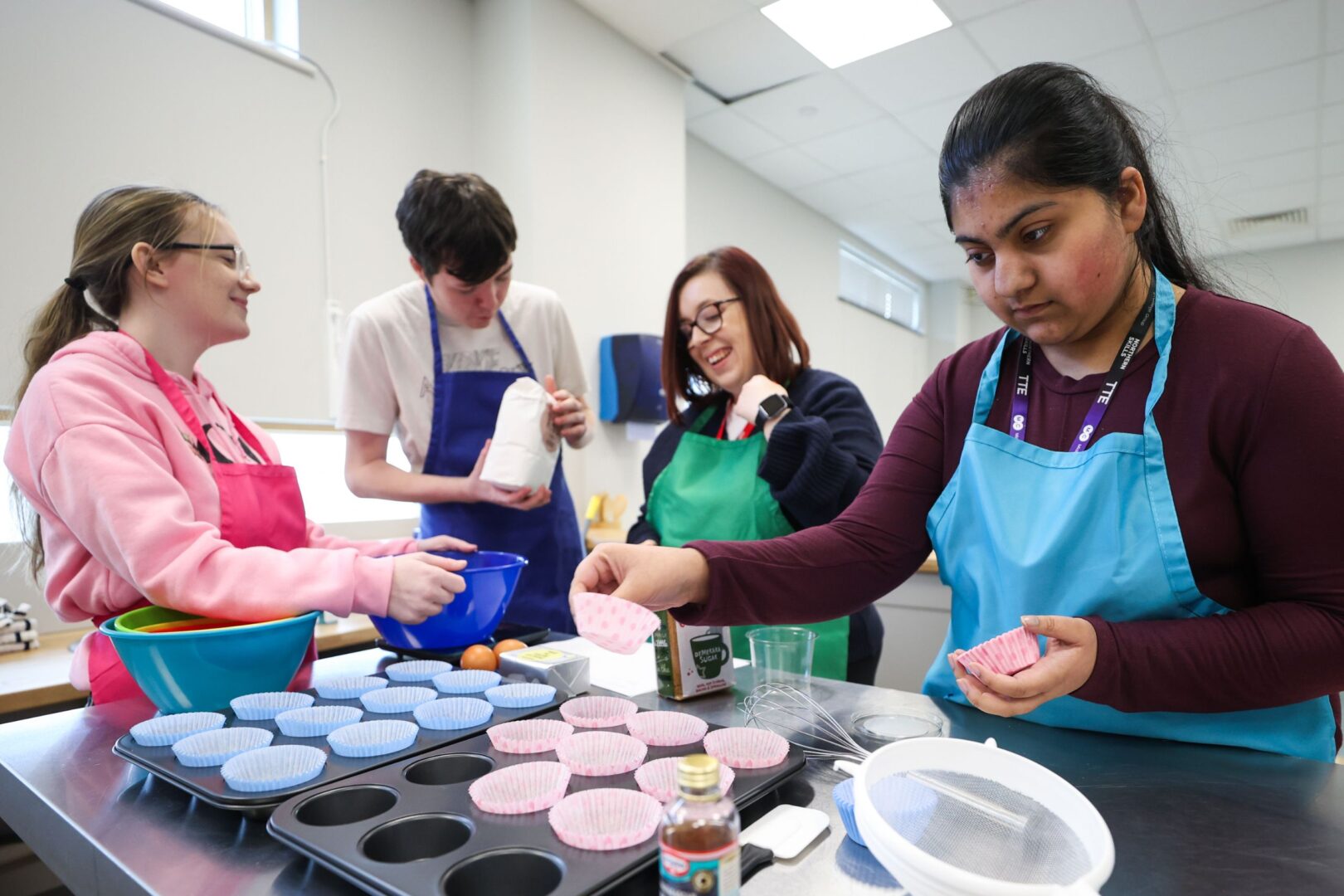 Inclusive Learning students baking in kitchen