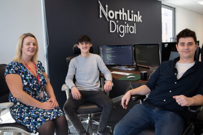 T Level student with employer and tutor
