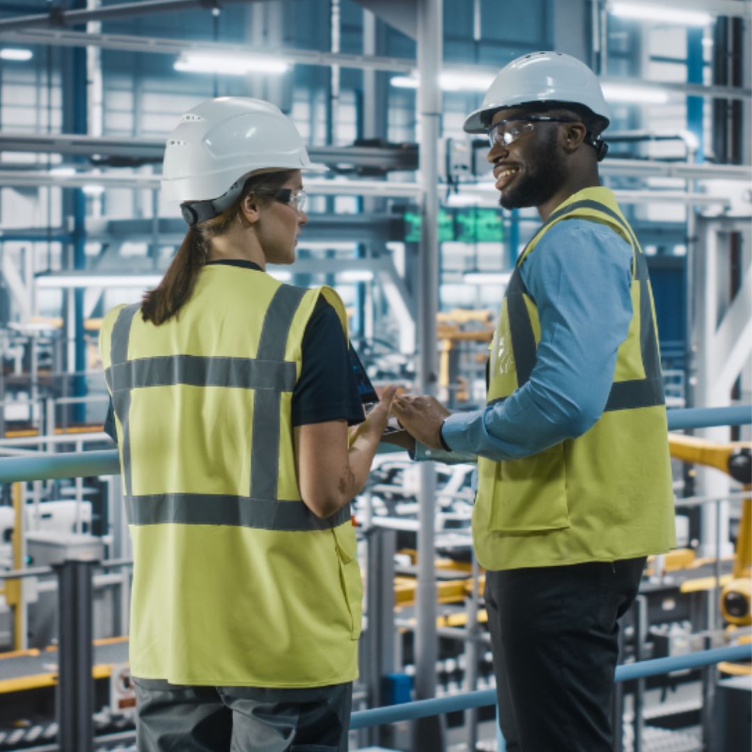 People wearing hi-viz and hard hats