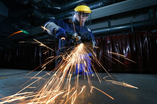 Student using grinder