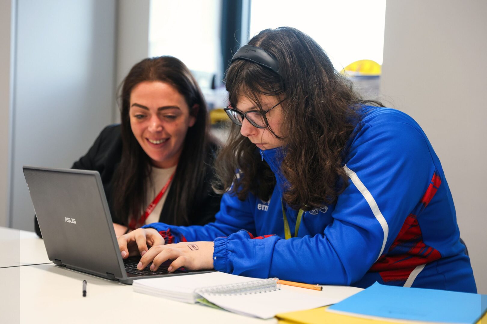 Inclusive learning student with support assistant