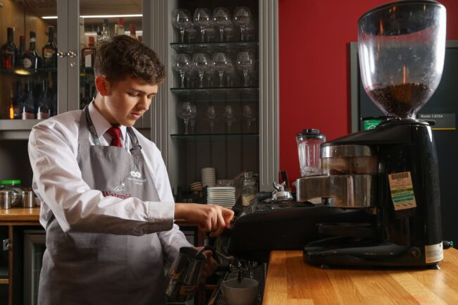 Student Pouring Coffee