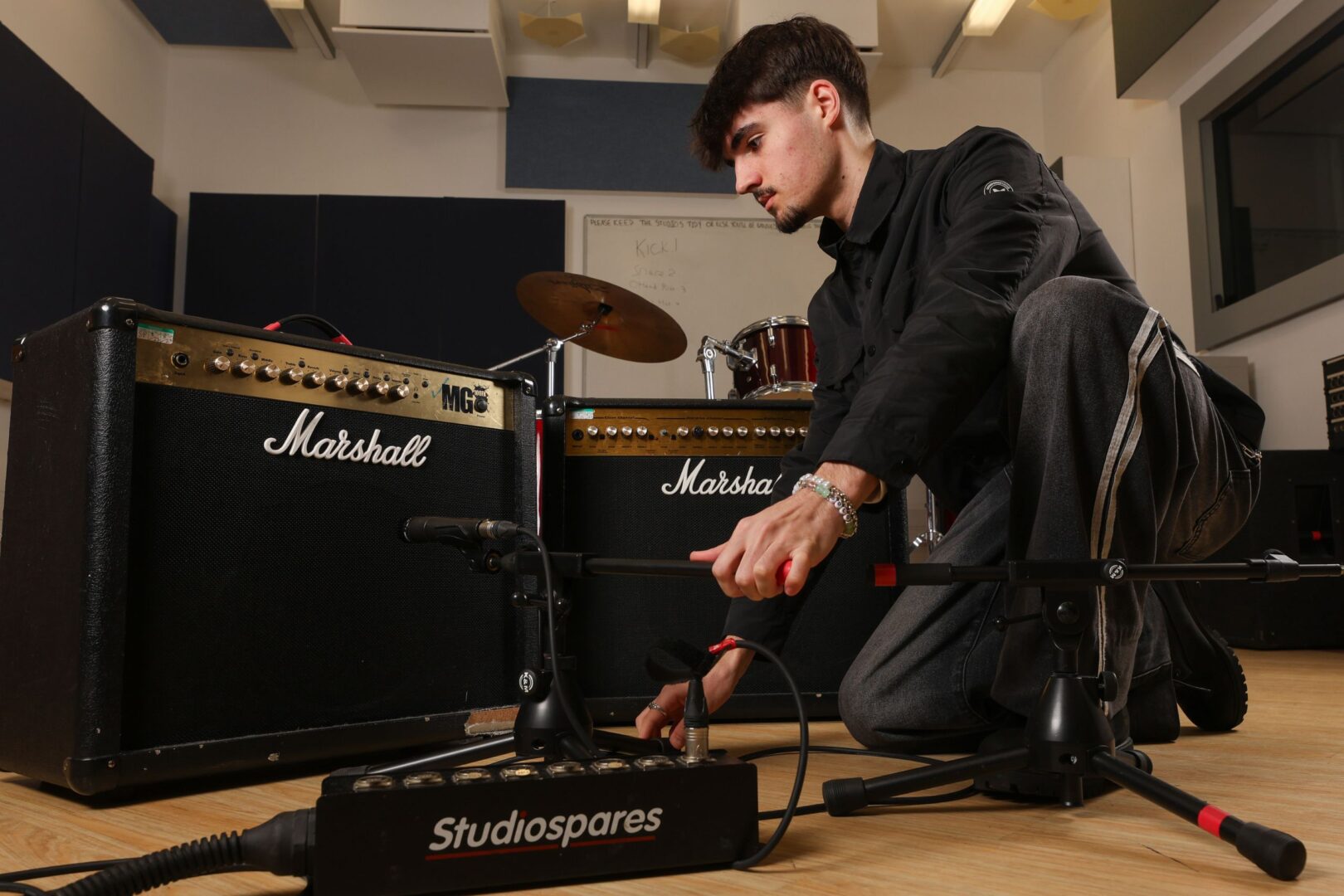 Student Setting Up Amp