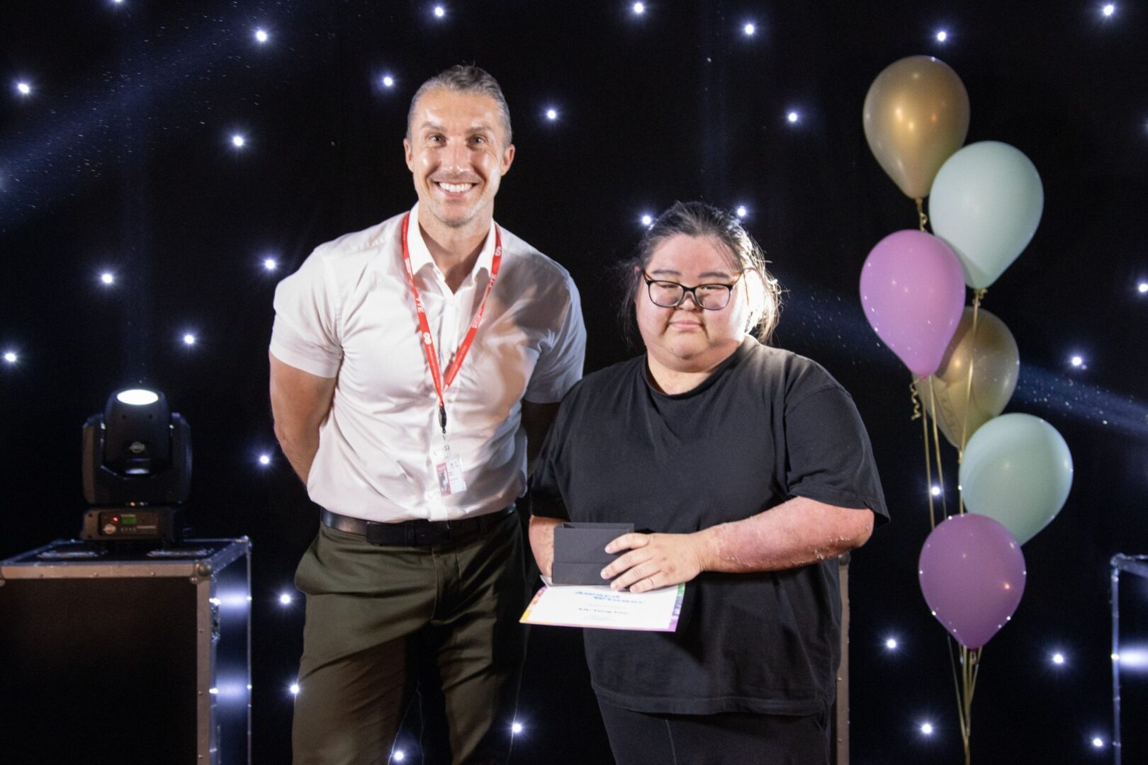 Ben Robinson Of MC With Catering And Hospitality Student Winner Kitty Yau