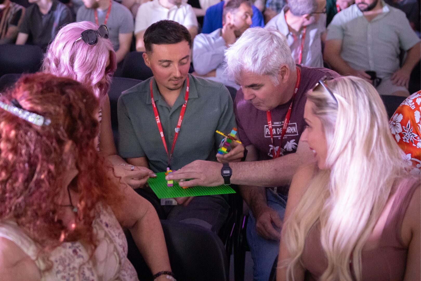Staff building lego at staff conference