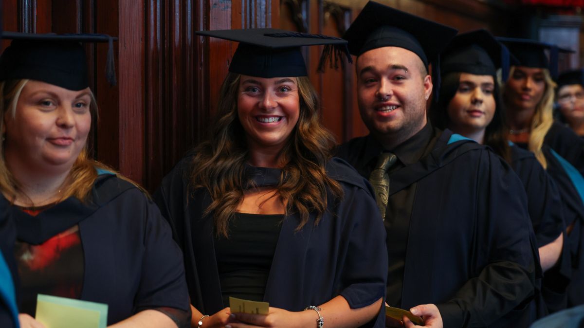 Graduates get ready to ascend the stage