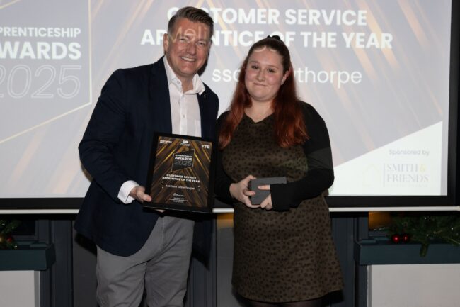 Customer Service Winner, Melissa Gawthorpe, with Sponsor Smith and Friends Estate Agents' Mark Smith.