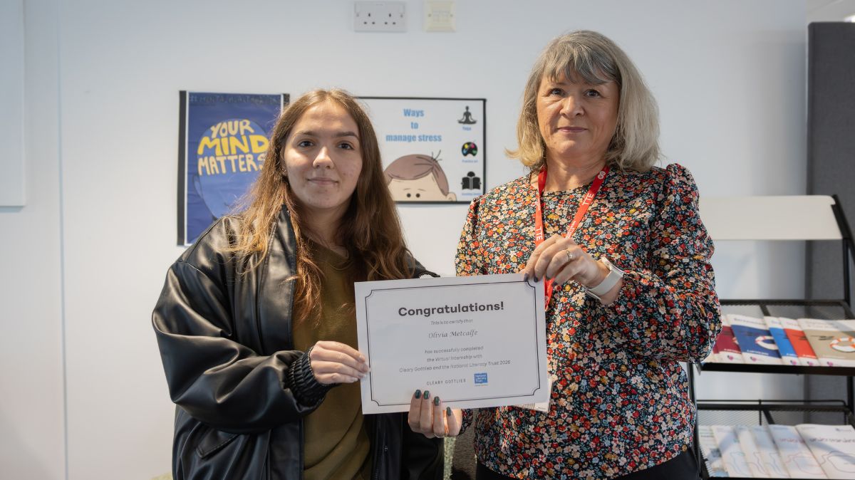 Tina Lucas presents certificate to A Level Law student