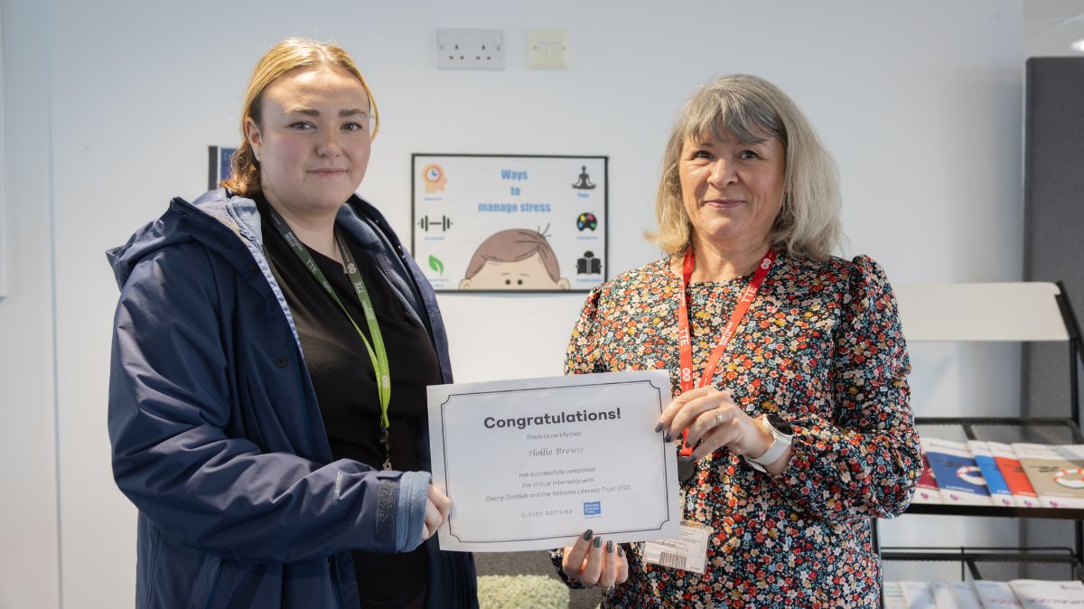 Tina Lucas presents certificate to A Level Law student