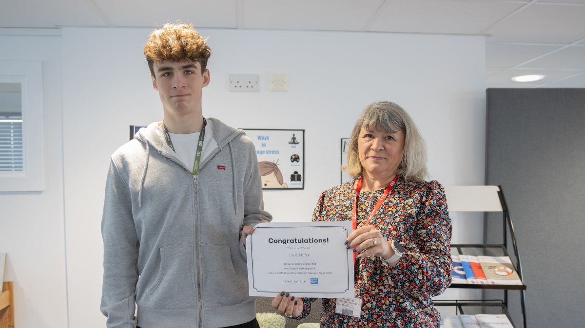 Tina Lucas presents certificate to A Level Law student