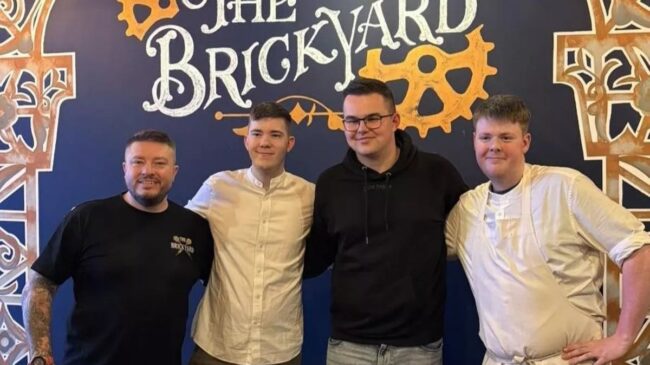 The Brickyard's owners Casey and Cameron Lewis, with World Darts Championship runner-up Gian Van Veen