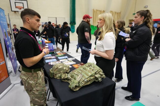 Students speak with Army