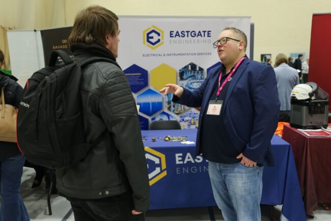 Student speaks with Eastgate Engineering