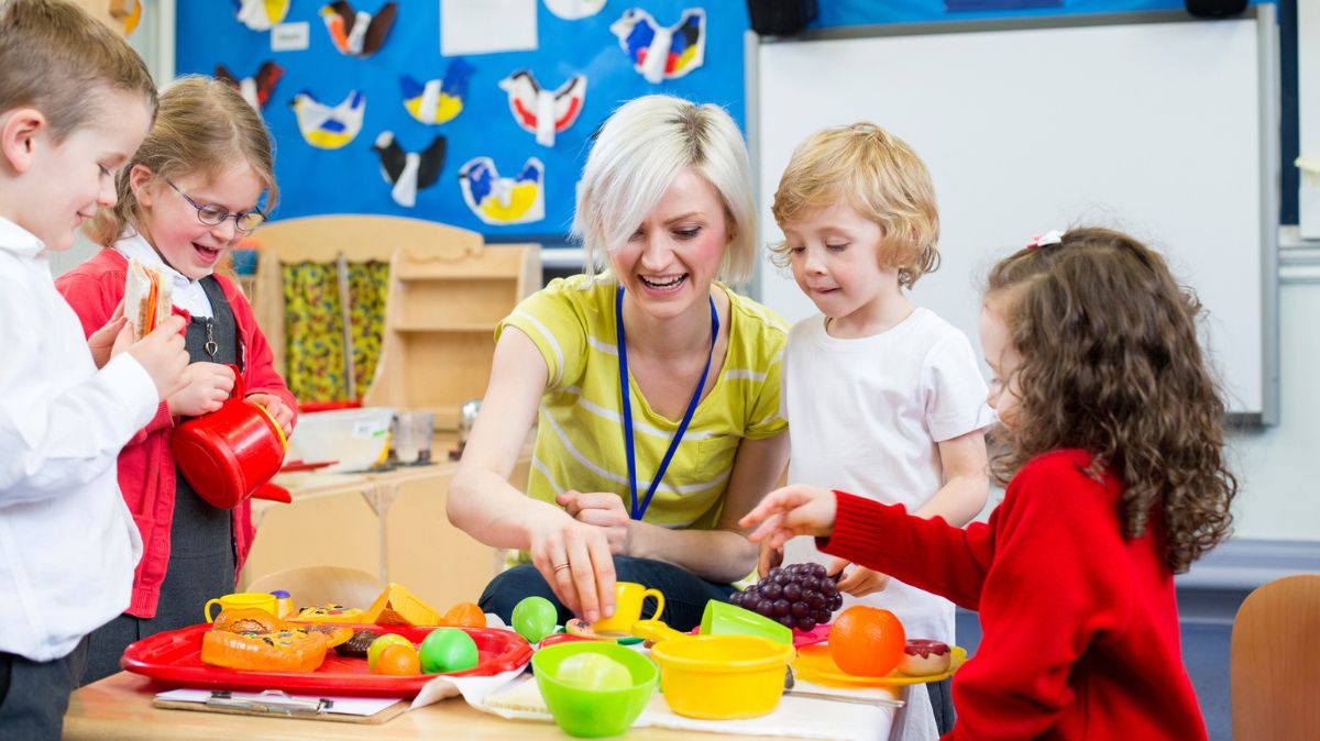 Teaching assistant with children