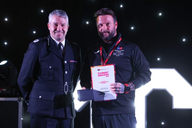 Cleveland Police's Assistant Chief Constable Wayne Fox, with tutor Aaron Carabine, on behalf of Public Services Student of the Year, Ellenor Bunce.
