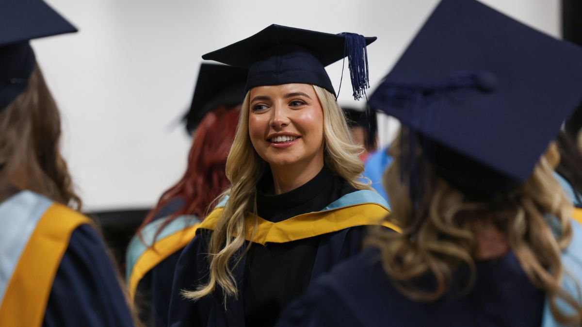 Higher education student at graduation