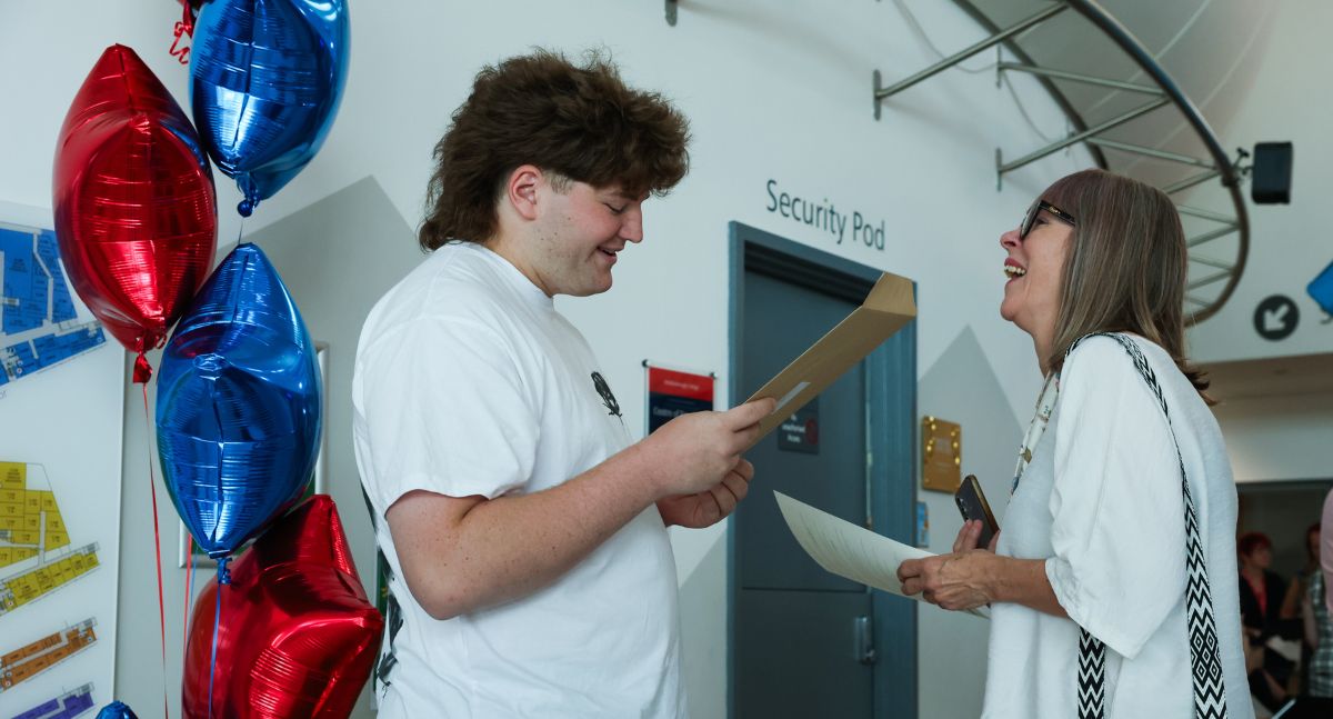 Finn Simpson-Murphy and mother celebrate results