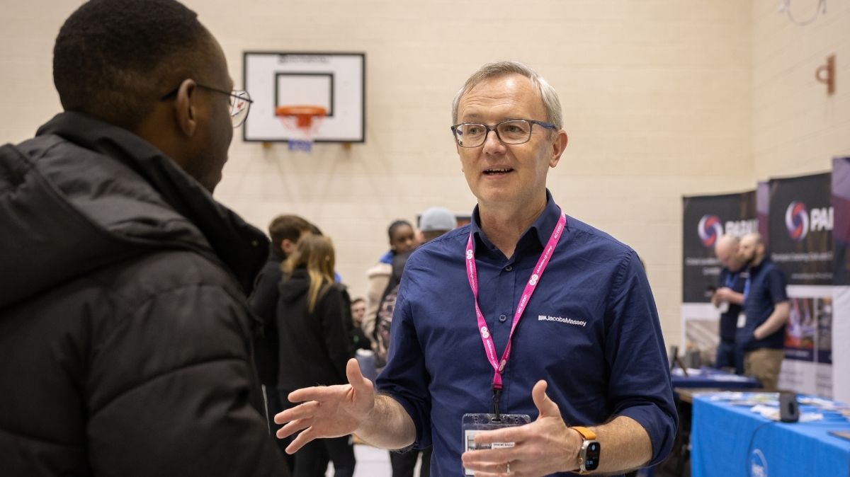 Employer talking to student