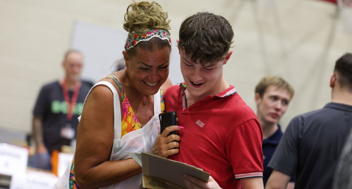 Charlie Wanless and mother celebrate his results