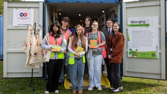 Level 3 Art & Design and Fashion students with Kelly Lisle from Middlesbrough College celebrate the opening of their exhibition Belonging at Middlesbrough Art Week supported by Mayor Chris Cooke