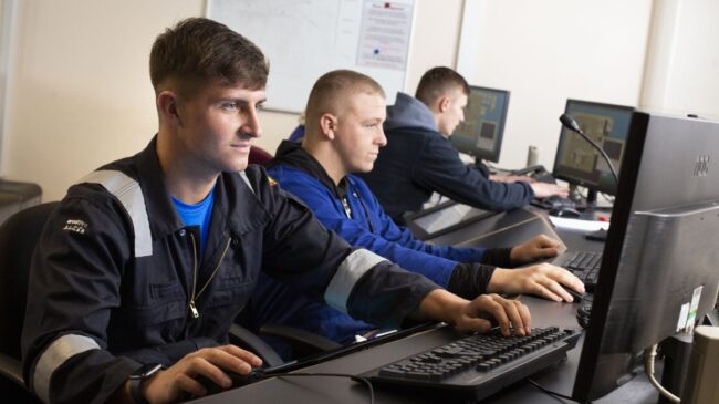 Process engineering students in workplace